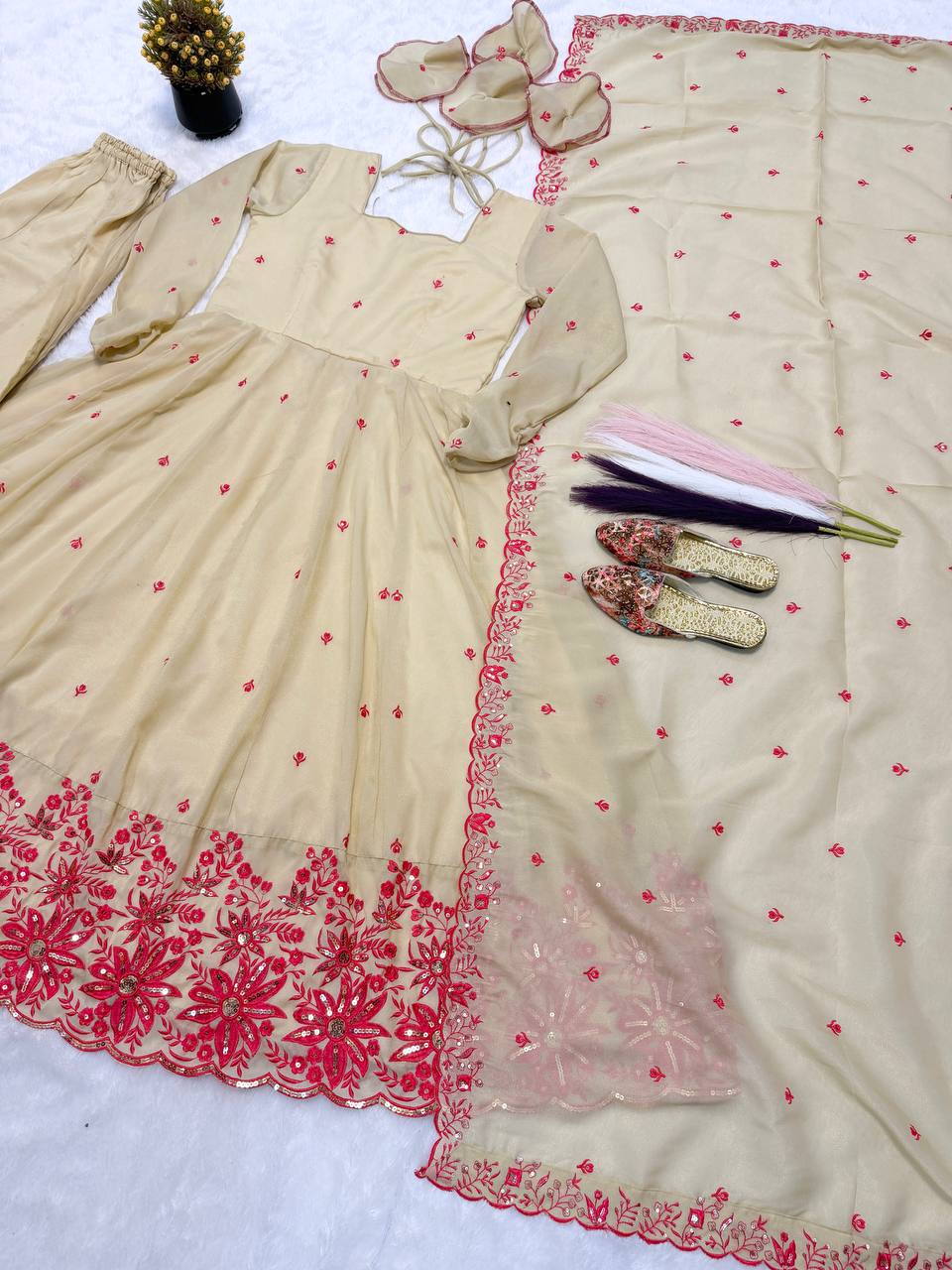 Exquisite Beige Flared Anarkali Suit Set Adorned with Vibrant Red Floral Embroidery, Sequined Scalloped Hem, and an Elegant Tie-Up Back